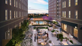 a rendering of a courtyard with seating and tables in a building